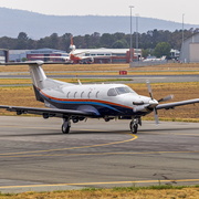 Australian Flight Operations (VH-UVE) Pilatus PC-12-47E taxiing at Canberra Airport.jpeg